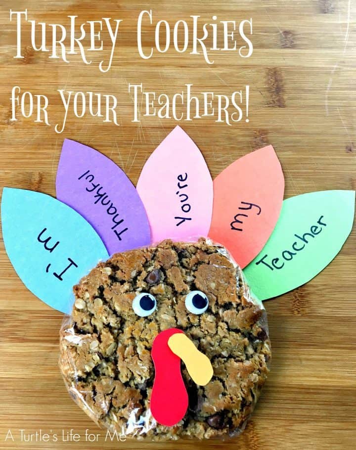 A vertical image of a thanksgiving turkey cookie craft against a wooden background. The text says Turkey Cookies for Your Teachers