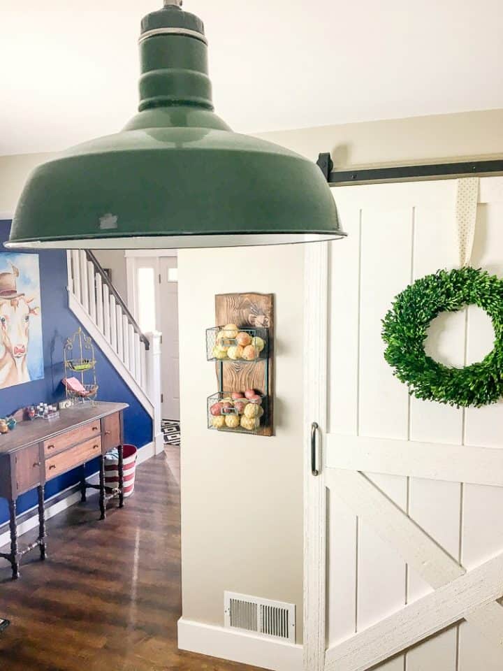 farmhouse kitchen and colorful modern hallway with DIY barn door