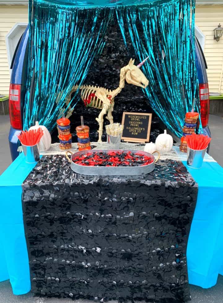 trunk or treat with unicorn and black and teal decorations